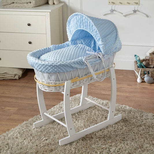 Blue wicker Moses basket with stand and padded hood, white frame and blue bedding