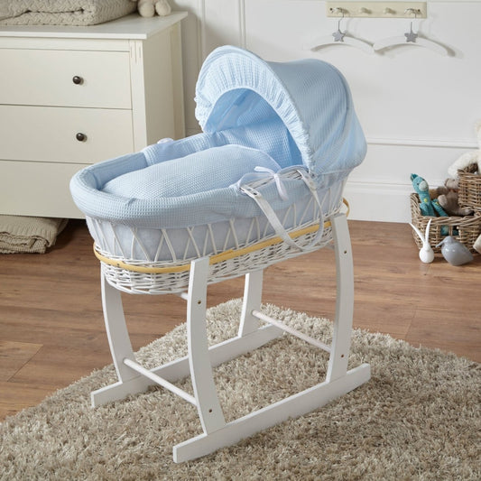 Blue waffle Moses basket with white wicker, on rocking stand