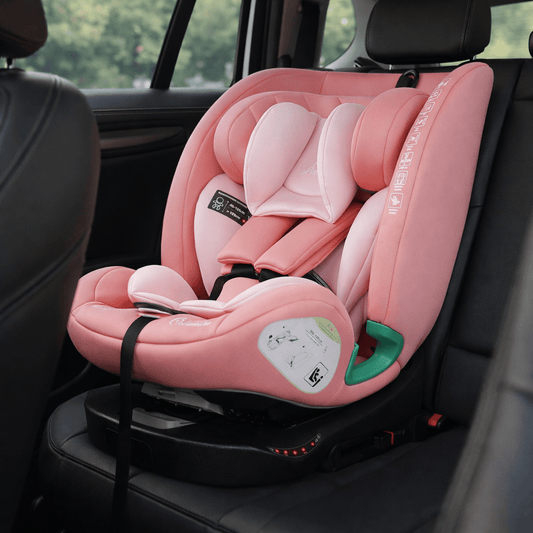 Blush rose car seat installed in vehicle, padded headrest, harness and ISOFIX base