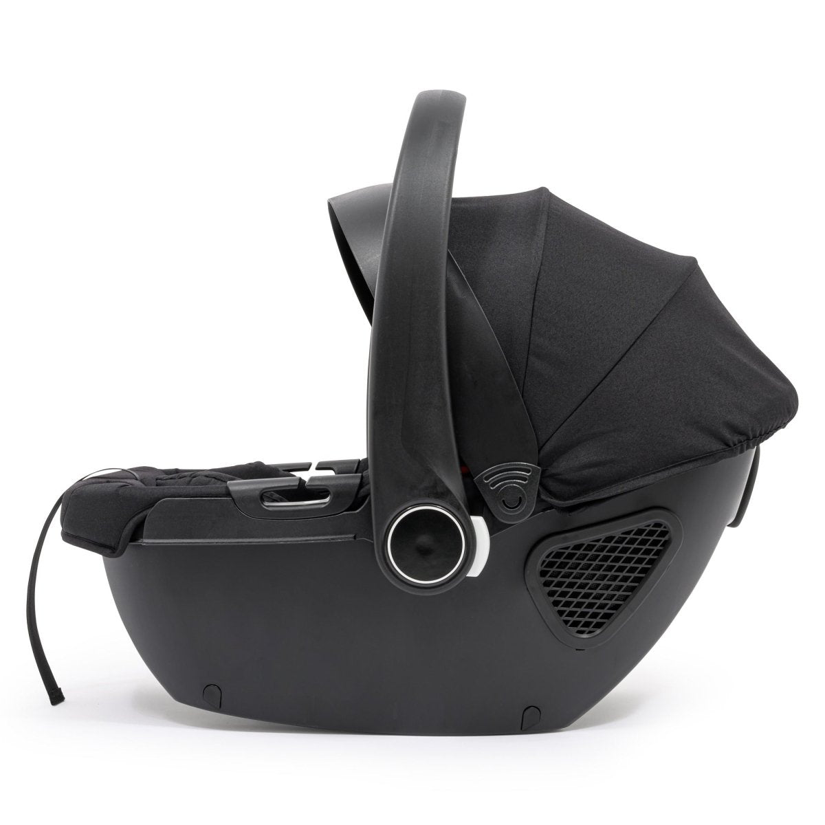 Black infant car seat with carry handle and ventilation panels, side view