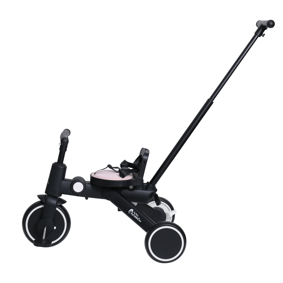Side view of foldable trike with pink seat and canopy, black handlebar and wheels