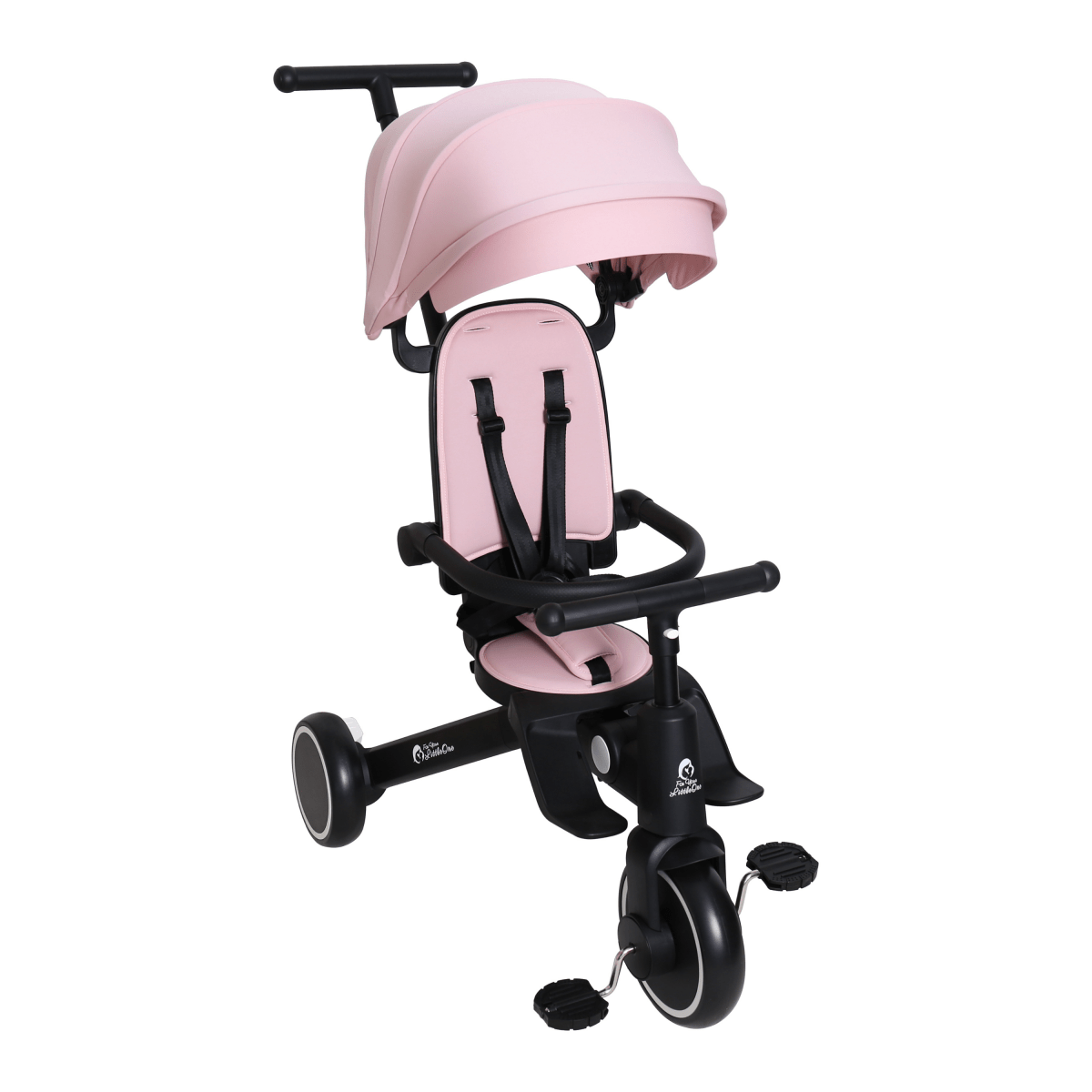Front view of foldable trike with pastel pink canopy, seat harness, and handlebars