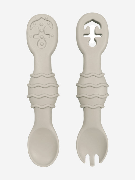 Grey silicone spoon and fork set with wavy grips