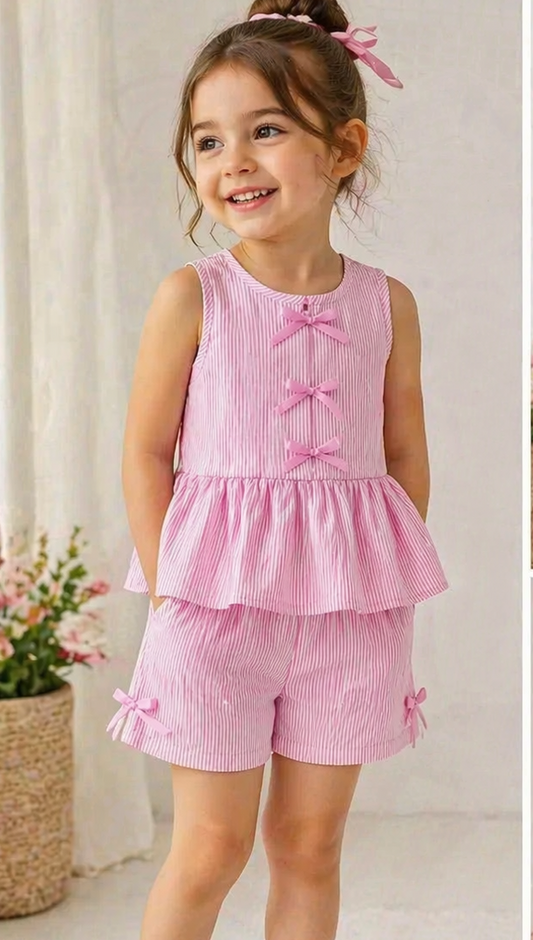 Girls pink striped peplum top and shorts set, bow detail on front
