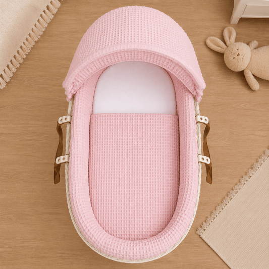 Pink waffle moses basket hooded cover with ties and padded sides