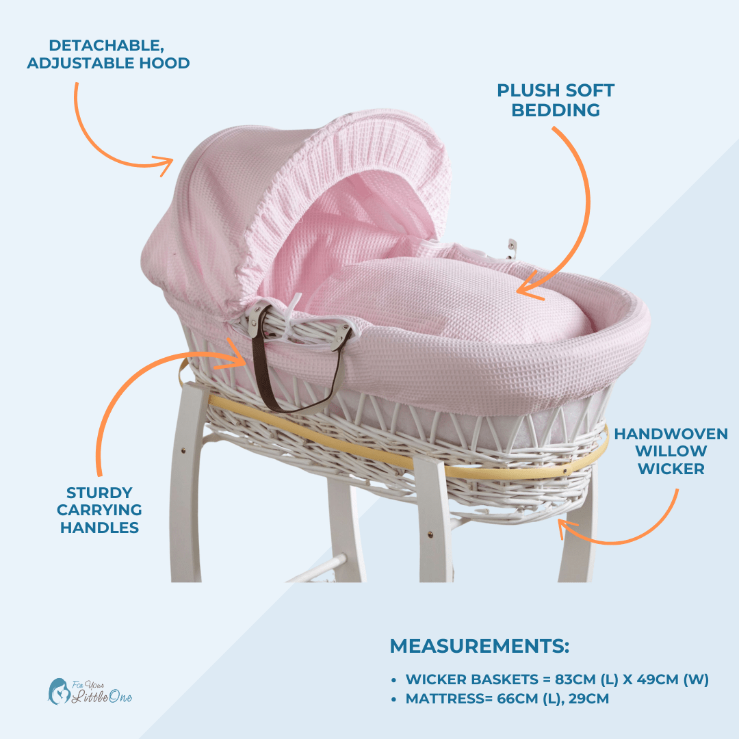 Pink Moses basket with detachable adjustable hood, plush bedding, and carry handles