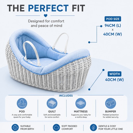 Blue wicker moses basket with padded quilt and carrying handles