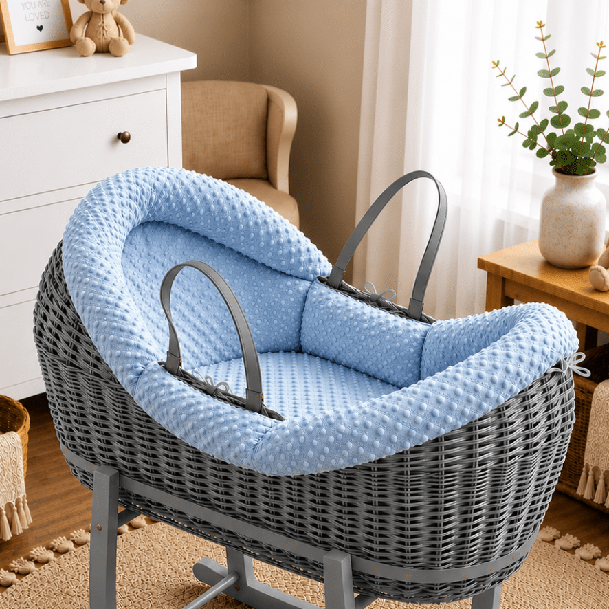 Wicker moses basket with blue textured carrycot insert and dark-gray handle straps