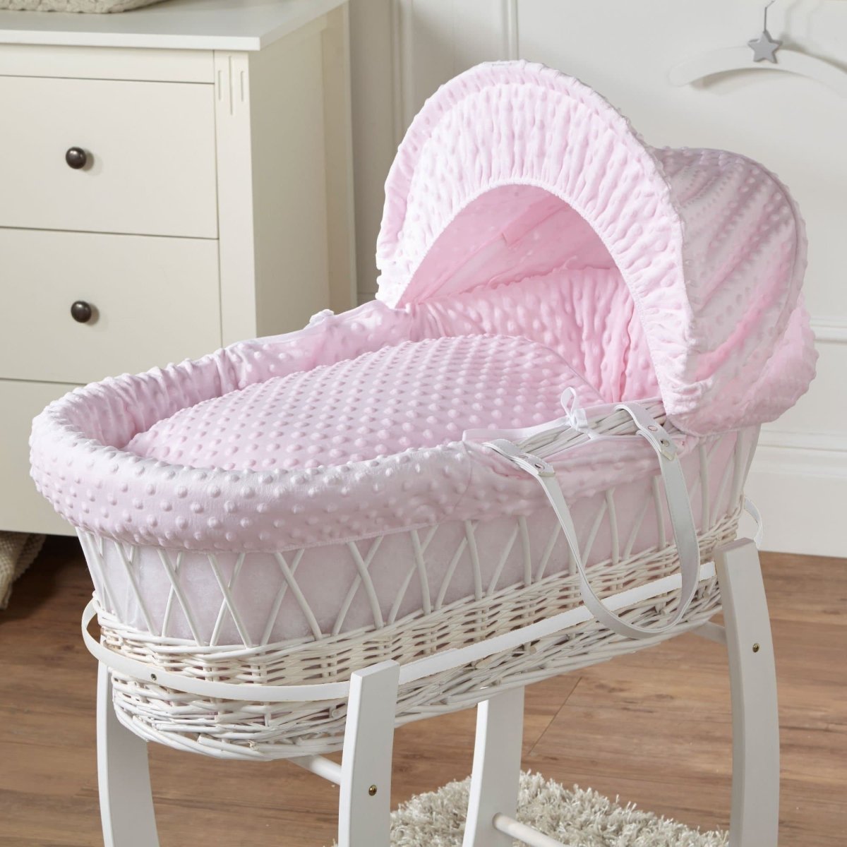 Wicker Moses basket with white frame and pink dimple bedding, no stand