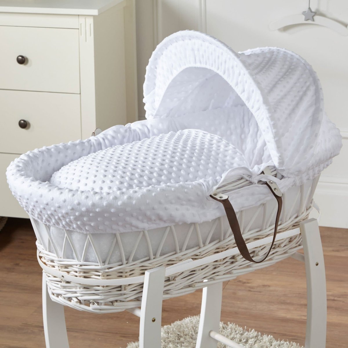 Wicker Moses basket with white dimple bedding and white frame, no stand