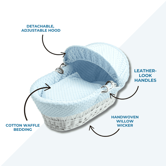 Wicker Moses basket with blue waffle bedding, adjustable hood and leather-look handles